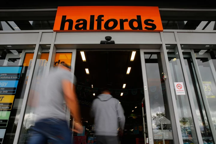 Halfords Slumps After UK Automotive Retailer Cuts Guidance