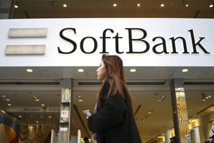 Japan's tech investor SoftBank trims losses and promises offensive turnaround