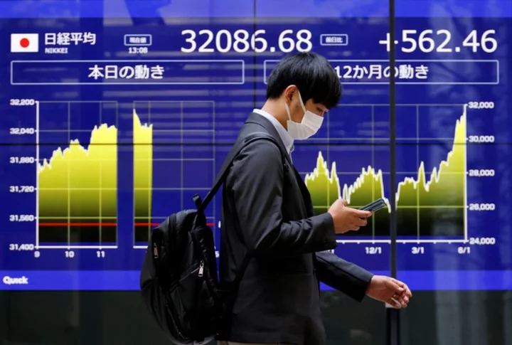 Asia shares near 4-month peak, yen falls as BOJ maintains policy