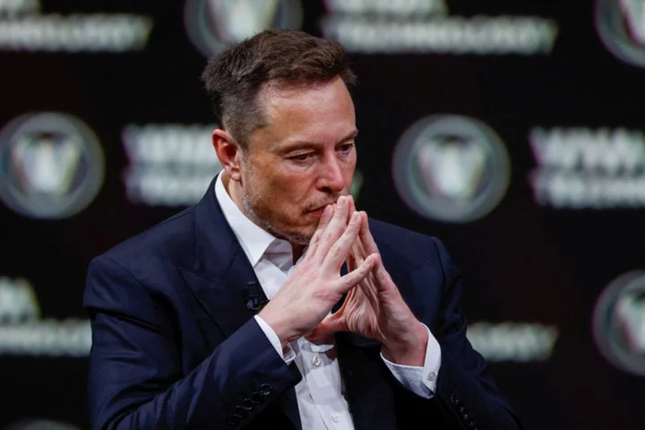 Tesla's Elon Musk optimistic on progress for self-driving, robots
