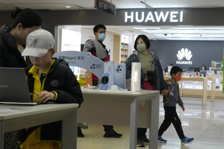 Chinese tech giant Huawei reports sales, profit up despite US sanctions