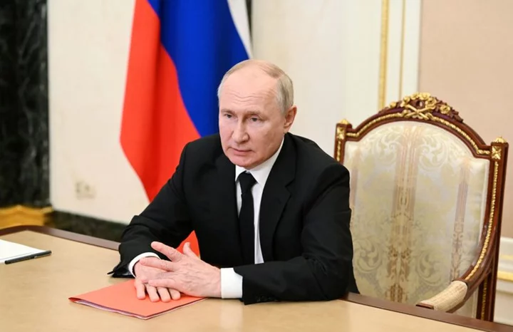 Putin signs law on windfall tax