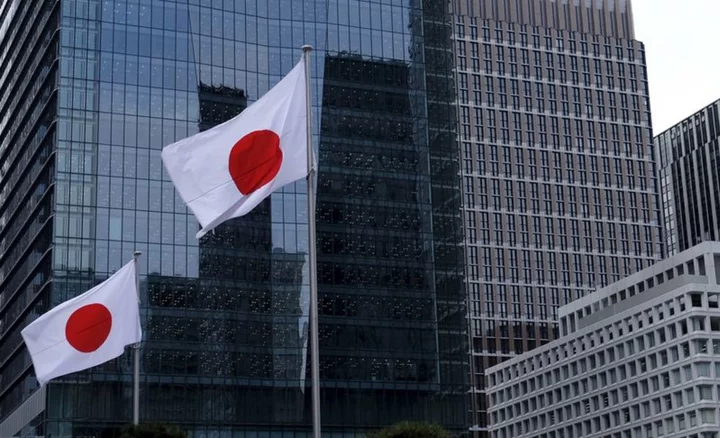 Japan maintains modest economic recovery view, raises corp profits assessment
