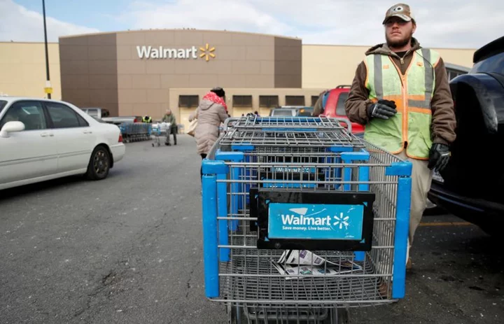 Walmart raises forecasts, tops sales estimates as lower prices pull in shoppers