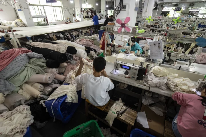 China Factory Activity Expands Moderately, Caixin Survey Shows