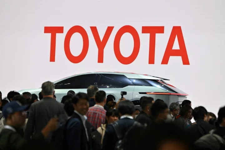 Toyota hikes annual forecast as first-half net profit doubles