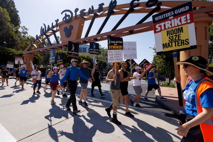 Hollywood writers union ratifies three-year labor contract after strike