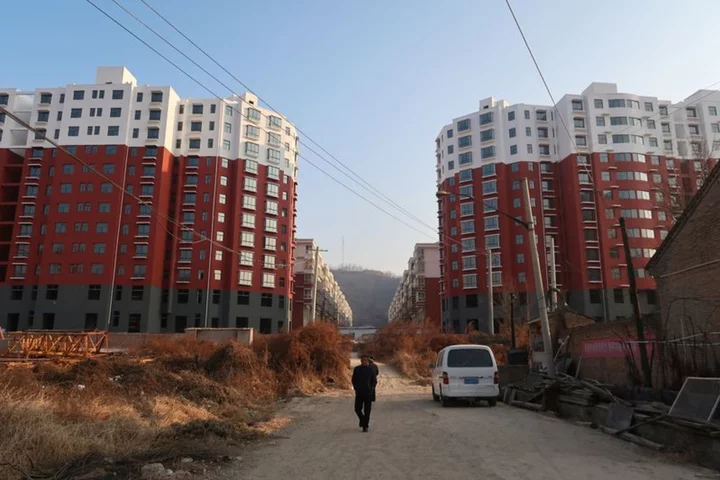 China seeks to boost demand by pushing urban development - state media