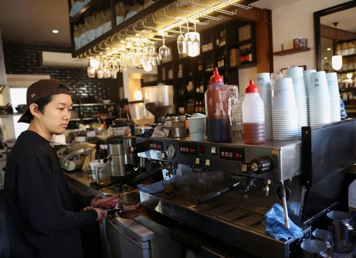 Analysis-Ground down: Australia coffee shops an early inflation casualty