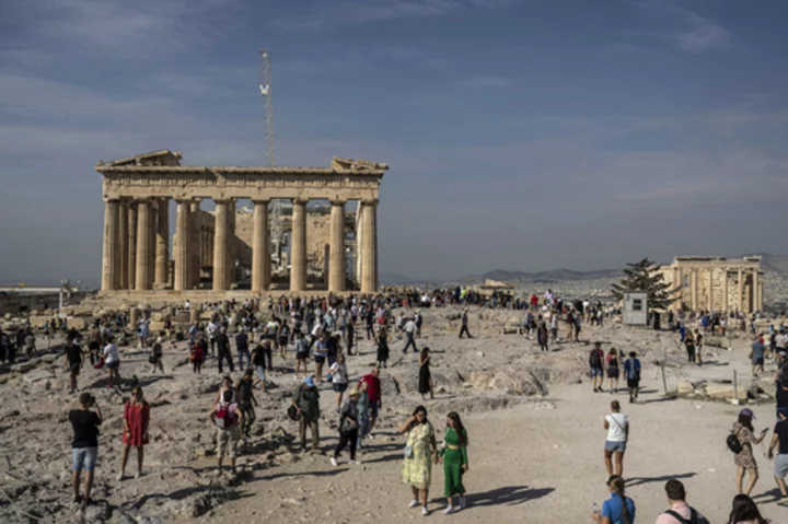 Greece plans hourly caps on visitors to ancient Acropolis and will let in up to 20,000 daily