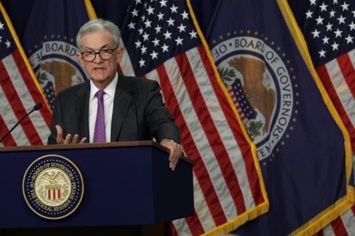 US Fed pauses rate hikes but expects another rise this year