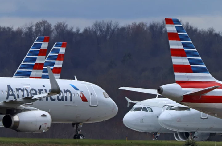 American Airlines posts $545 million loss on higher labor costs while rivals post big profits