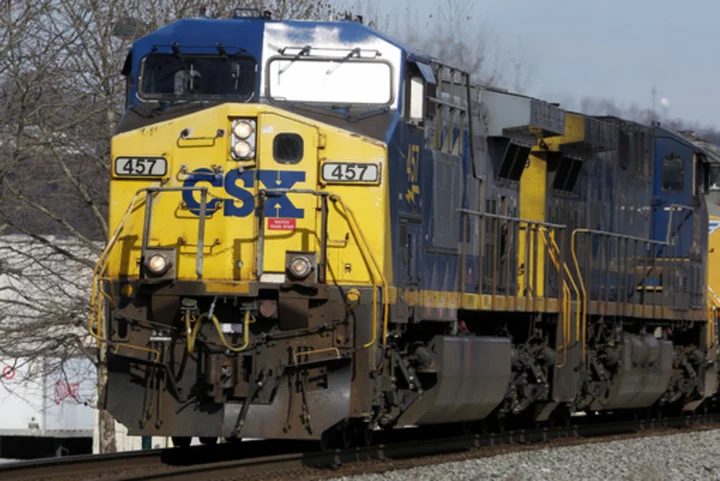 CSX's second-quarter profit declined as the railroad delivered fewer imported goods