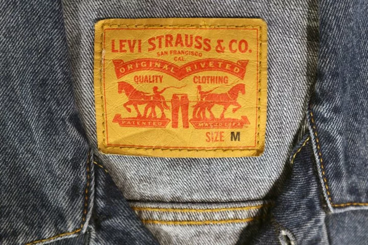 Levi Strauss trims annual profit forecast on higher costs, slowing wholesale trends