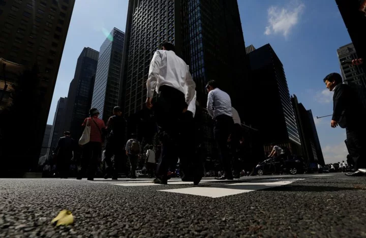 Japan business mood improves, but global stress dims outlook - Reuters Tankan