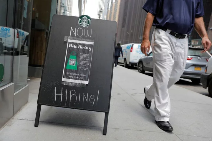 US weekly jobless claims rise slightly; trade deficit narrows sharply