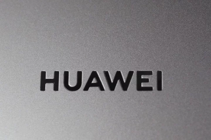 Taiwan probes four firms accused of helping China's Huawei