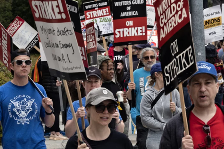 Hollywood writers at rally say they'll win as strike reaches 50 days