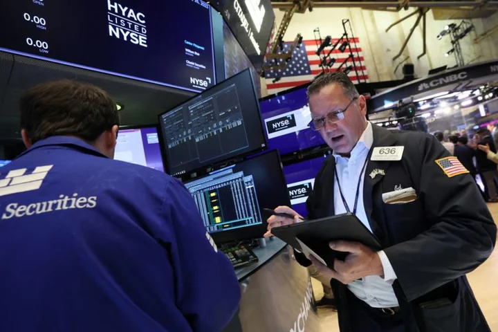 Futures subdued ahead of more megacap earnings, employment data
