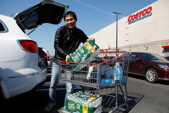 Costco tops quarterly revenue, profit estimates on steady grocery demand