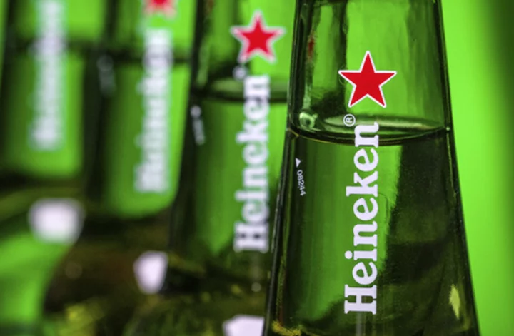 Dutch brewer Heineken sells its Russian operations for 1 euro, taking a 300-million-euro hit