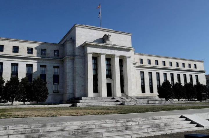 Banks tighten credit terms, see loan demand drop, Fed survey shows