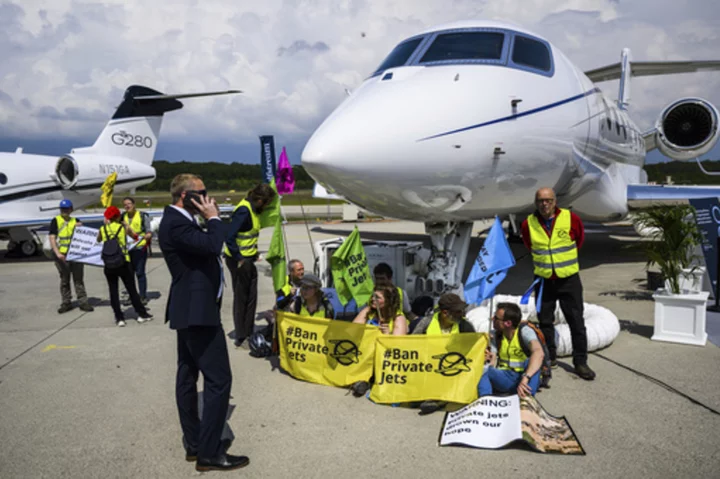 Geneva airport briefly closed as climate activists protest private jet fair