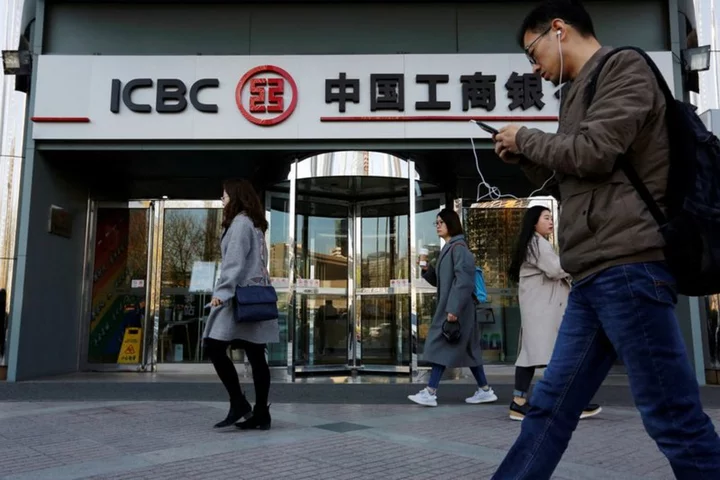 Slump in China bank loans raises more worries about recovery, adds pressure on central bank