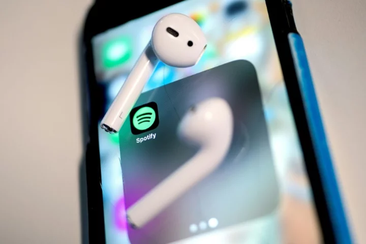 Spotify swings to profit as user numbers grow
