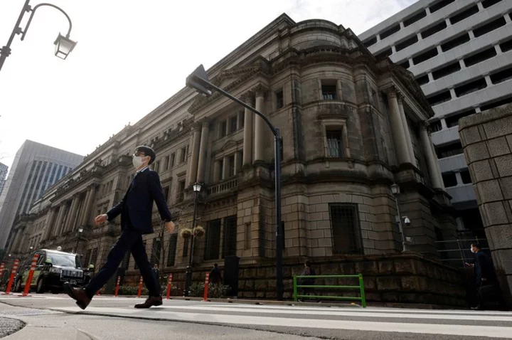 Japan industry minister: BOJ's policy aimed at 'buying time' will eventually end