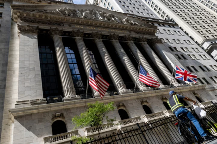 Stock market today: Wall Street inches lower ahead of what many hope is the Fed's last rate hike