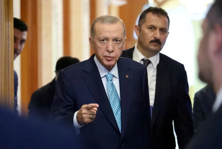 In turnaround, Turkey's Erdogan says tight policy to lower inflation