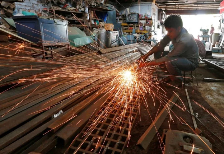 India factory growth accelerated in November, input costs at 40-month low -PMI