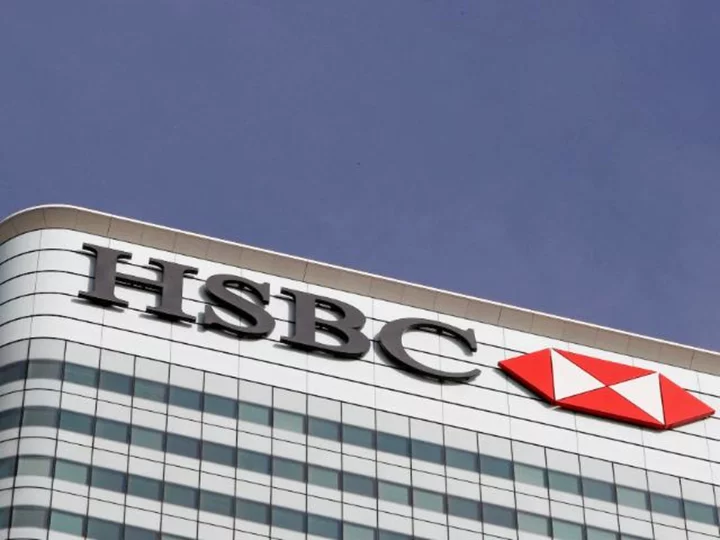 HSBC raises outlook as profits nearly double