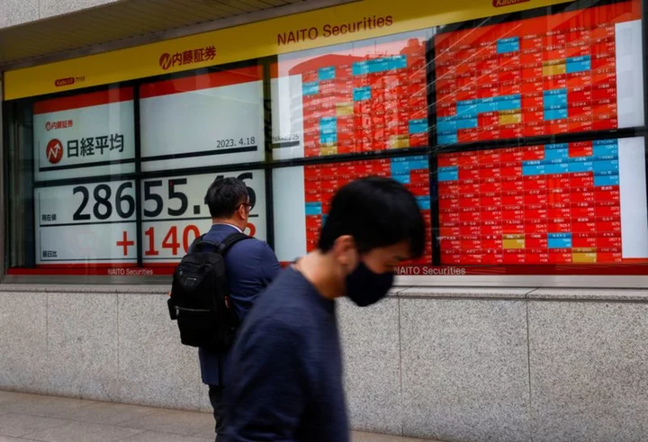 Asia stocks split as US-China outlooks diverge