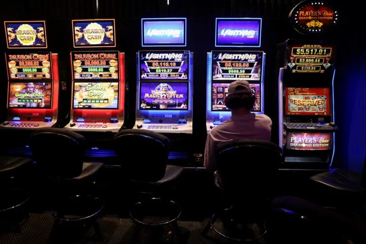 Australia's Endeavour shares hit record low as poker machine regulations land