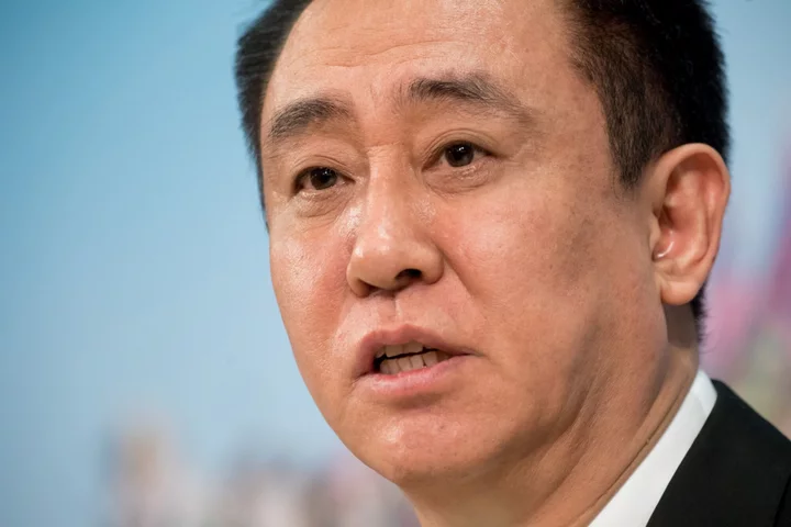 China Puts Evergrande’s Billionaire Founder Under Police Control