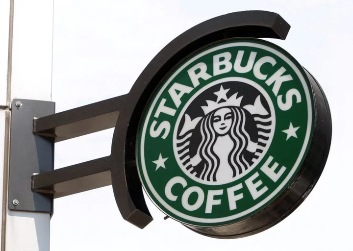 Starbucks employees at hundreds of US stores walkout on 'Red Cup' day