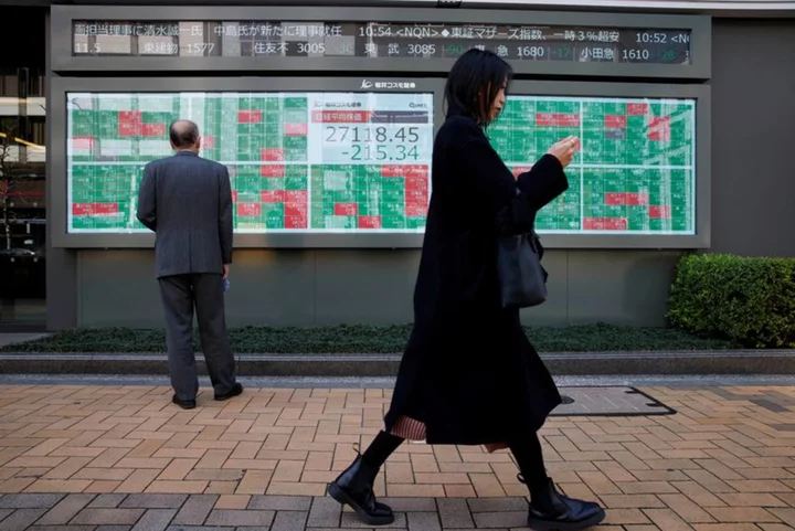 Asia shares pick up after Fed rate comments; oil dips