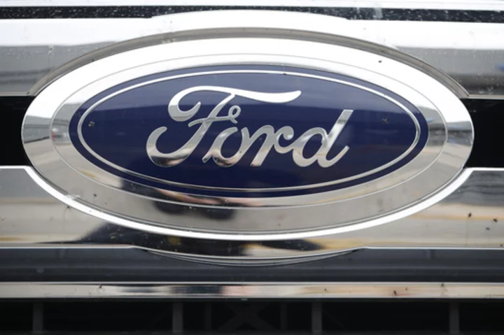 US probes complaints that Ford Escape doors can open while SUVs are being driven