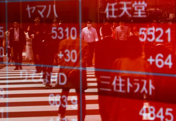 Asian stocks hit 9-month lows on worries over China, US rates