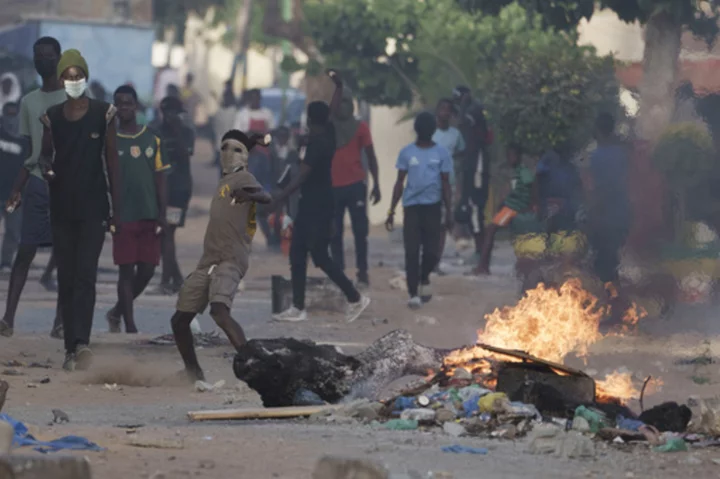 Senegal violence threatens country's stability as experts call on government to instill calm